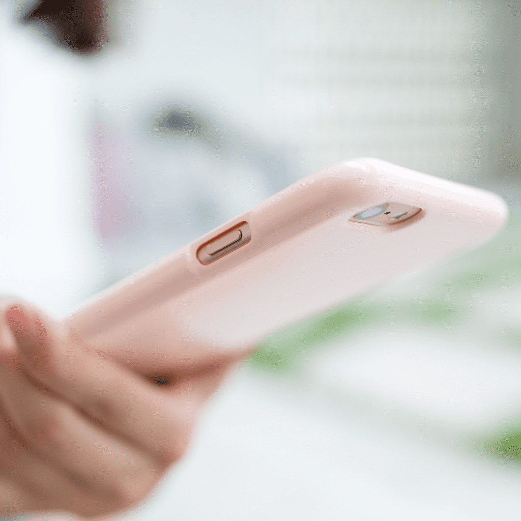 Pink Cell Phone in a woman's hand